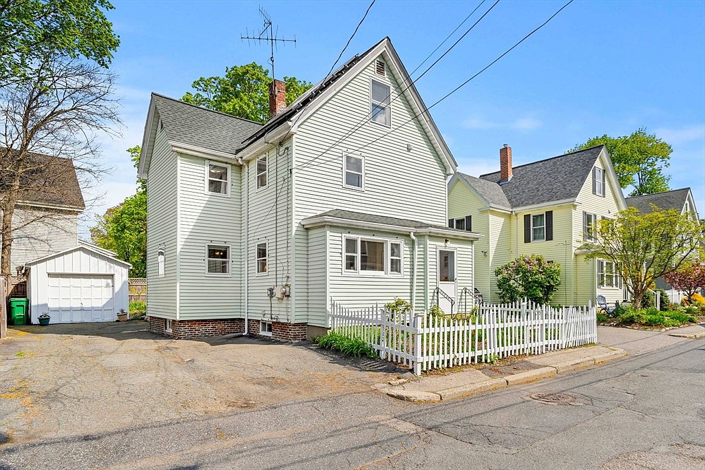 25 Alden Place, a white clapboard single-family home in West Newton